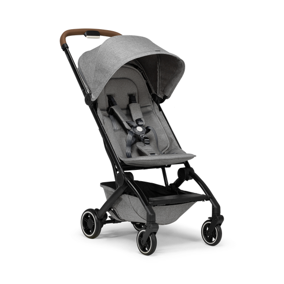 Compact folding clearance travel stroller